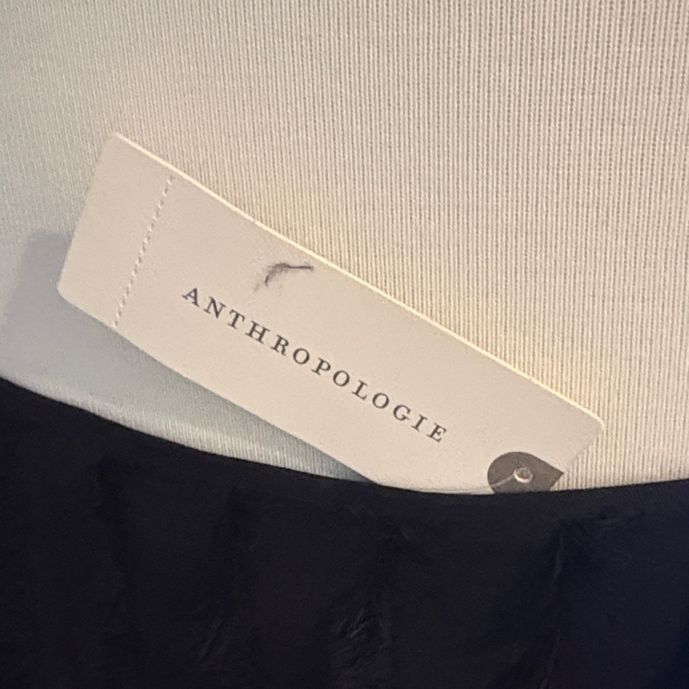 Anthropologie Black mini dress with texture and asymmetrical hen.Textured Skirt - Picture 2 of 12